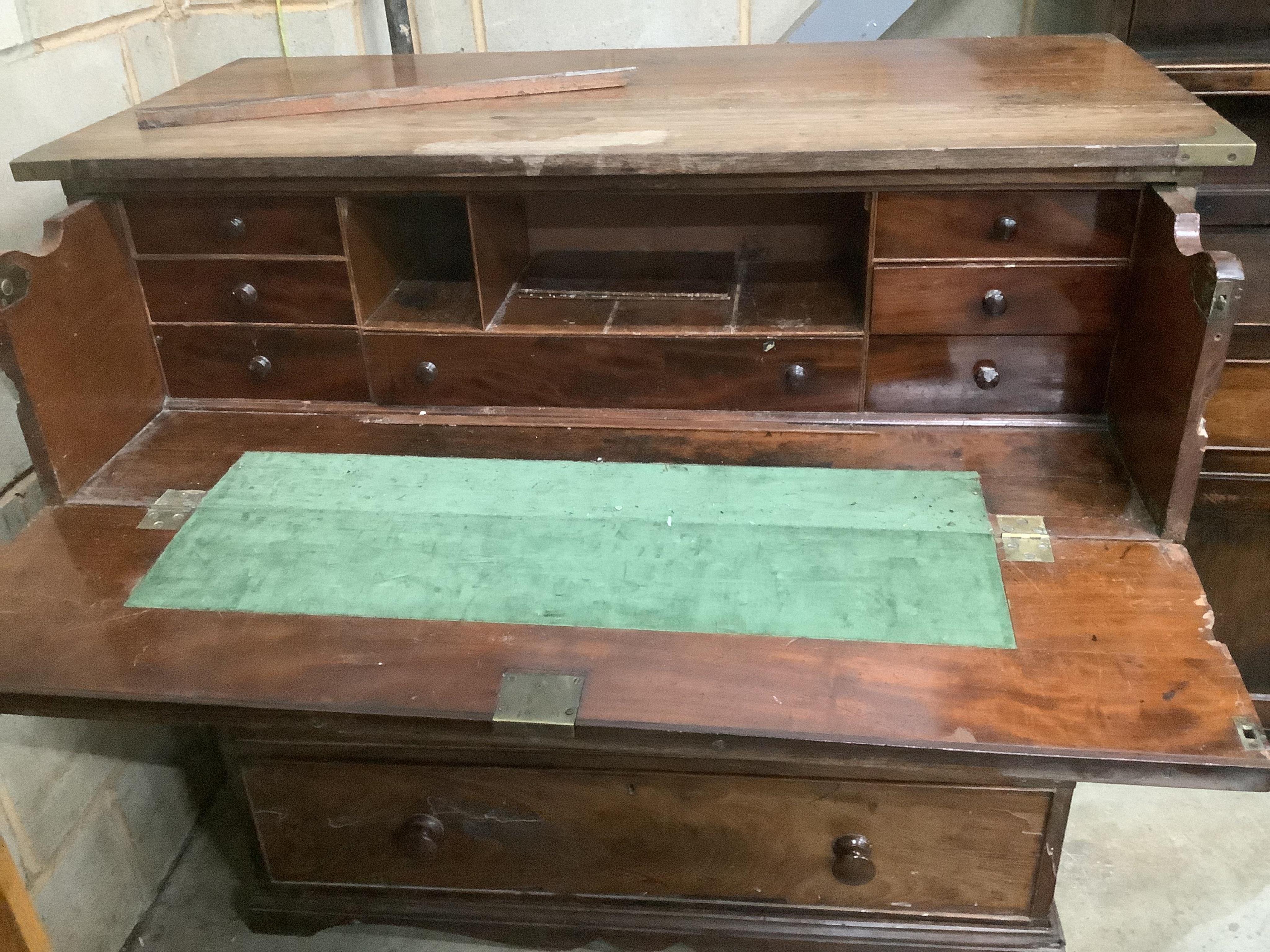 A 19th century hardwood two section military chest, the top drawer fitted as a secretaire, width 114cm, depth 54cm, height 111cm. Condition - poor